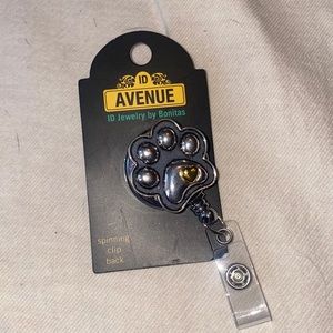 Paw print badge reel